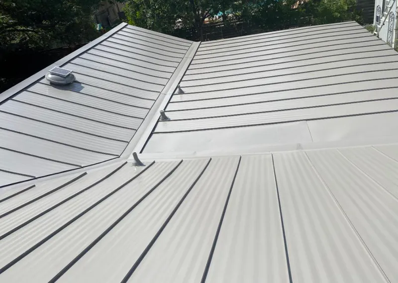 Solar attic fan installed on a metal roof for Roof Ventilation in Pahrump